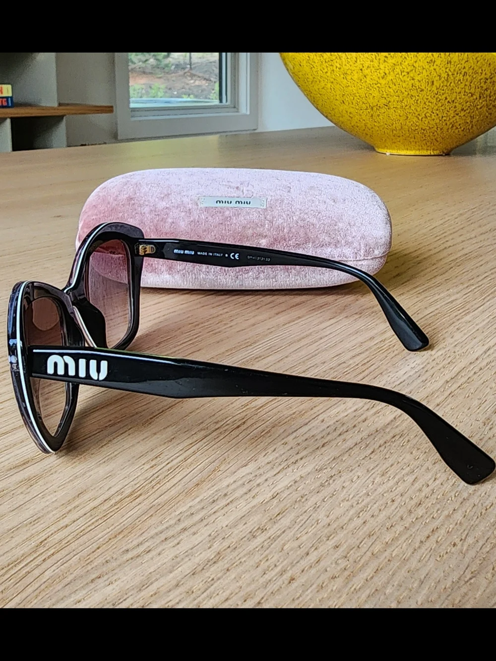 Miu Miu Women's Cat-Eye Black Sunglasses With White Star Pattern